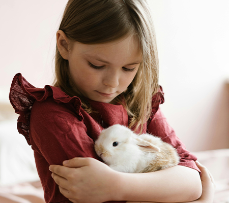 img-girl-with-bunny.png